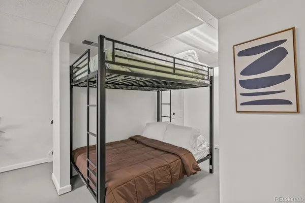 a bedroom with a bed and a walk in closet