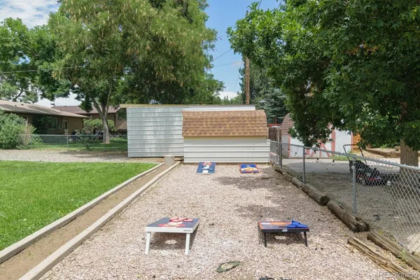 a view of a backyard with a patio