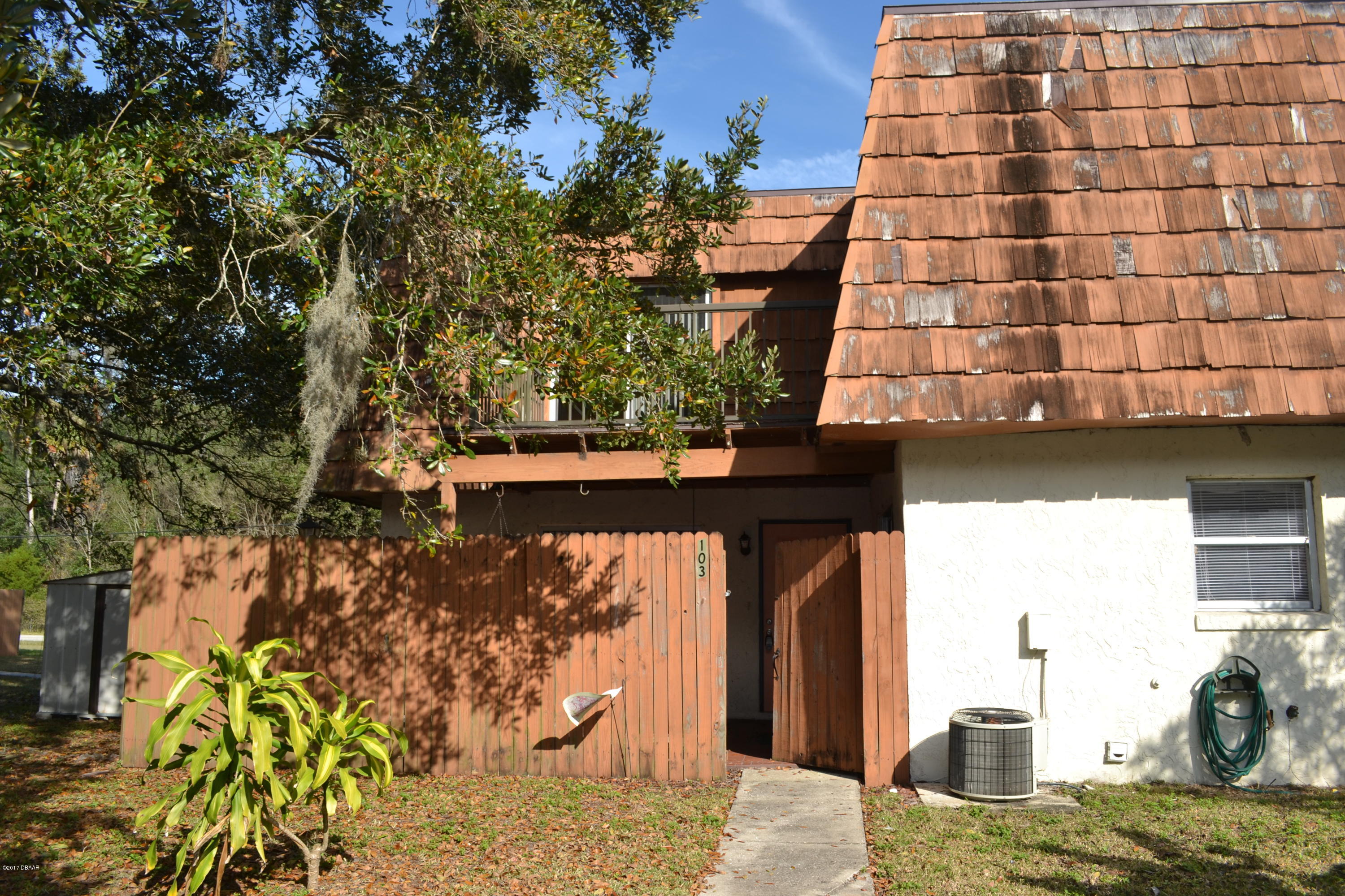 103 Springwood Square Port Orange, FL 32129 - Photo 1 of 18 Front of House