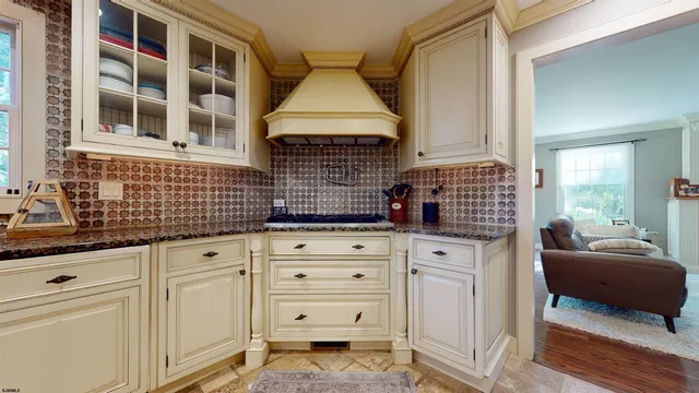 a bathroom with a sink toilet and a mirror