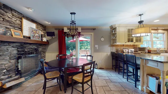 an aerial view of residential house with outdoor space and street view