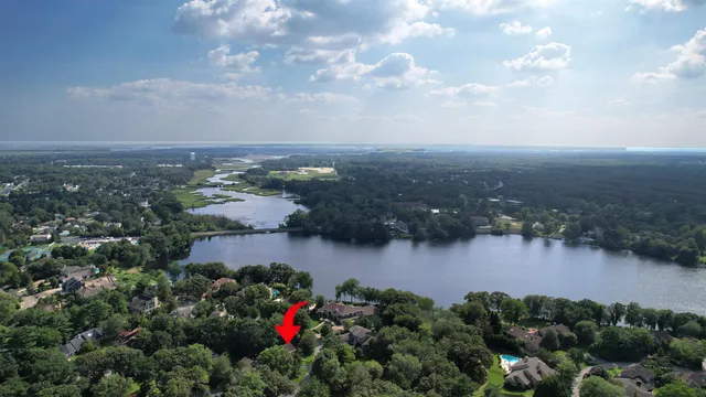 an aerial view of residential house with outdoor space and street view