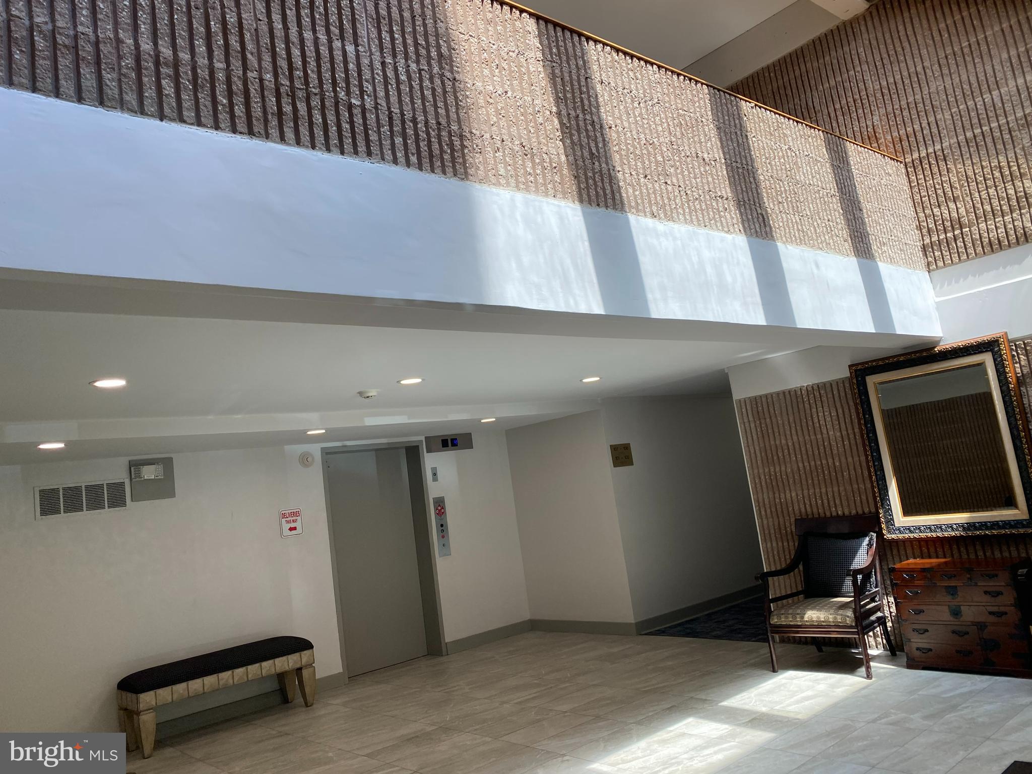 2903 Fallstaff Road, Unit 302 Baltimore, MD 21209 - Photo 3 of 23 2 story Building Foyer