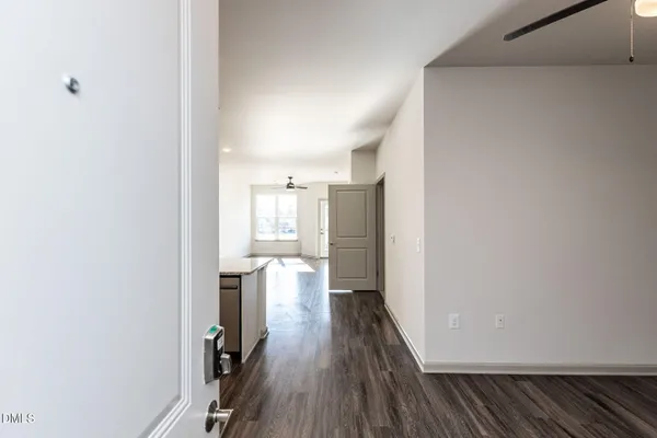 a view of entryway with wooden floor