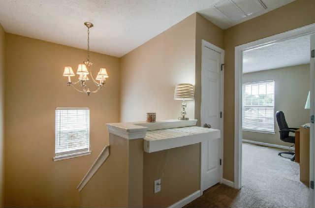 416 Creekside Lane Spring Hill, TN 37174 - Photo 12 of 14 Upstairs hallway where laundry room is located-W/D remains