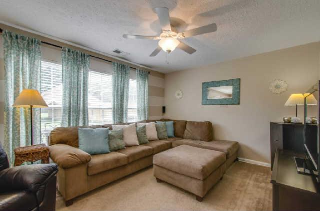 416 Creekside Lane Spring Hill, TN 37174 - Photo 7 of 14 Great room ceiling fan, lots of windows for light, 2"blinds (Drapes do not remain)