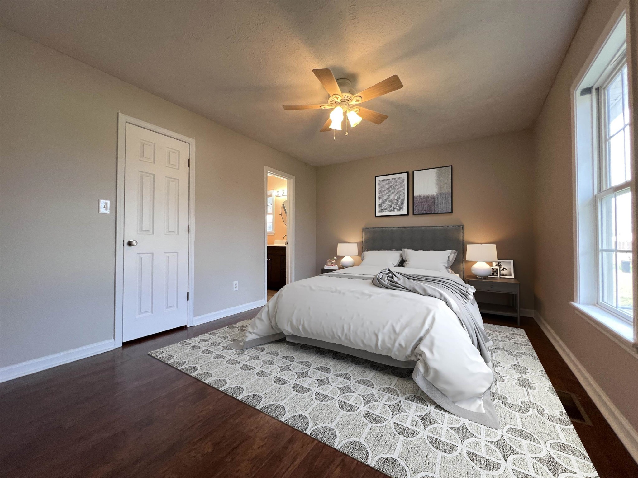 530 Stout Street Savannah, TN 38372 - Photo 12 of 39 a bedroom with a large bed and a window