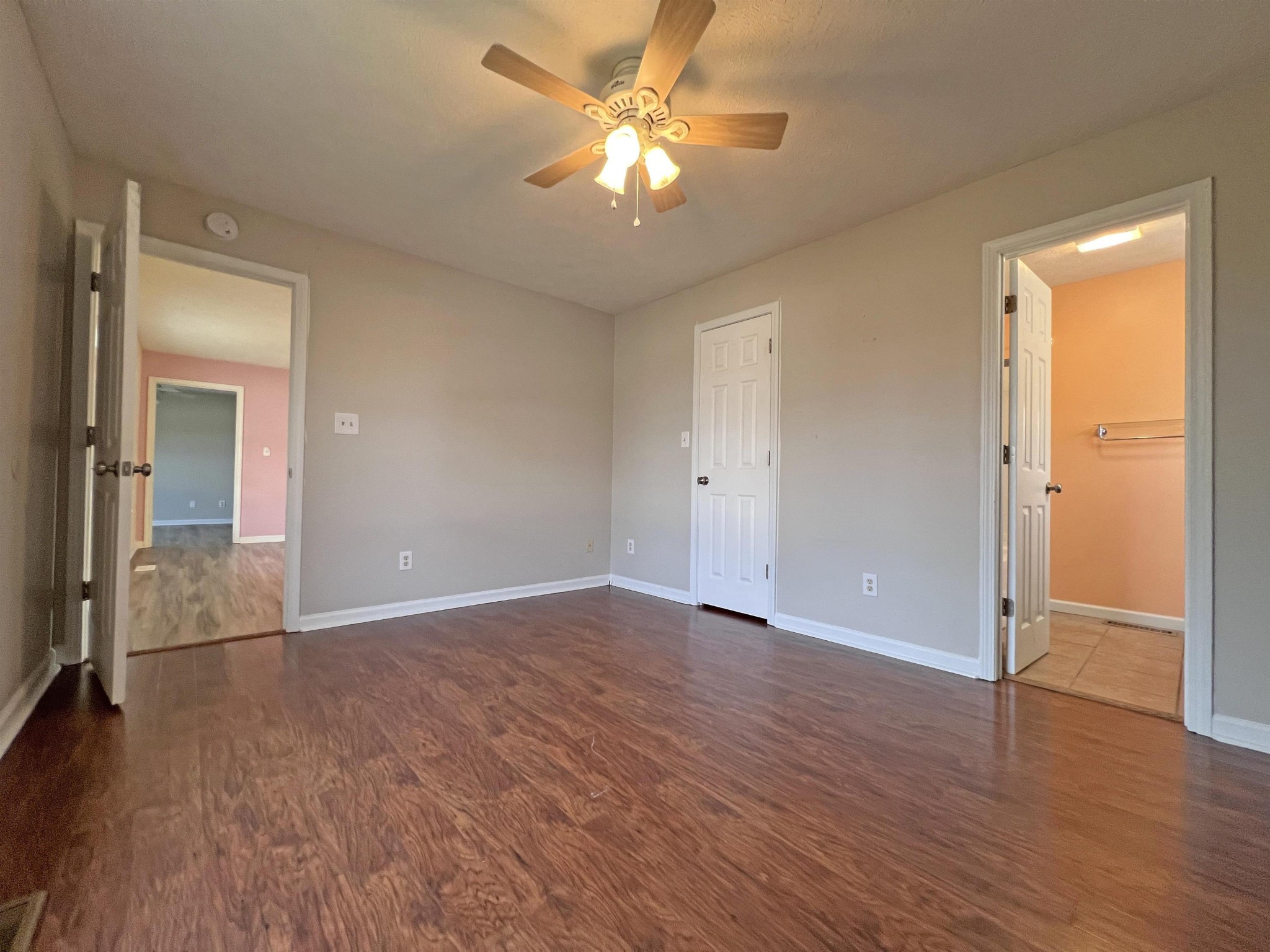 530 Stout Street Savannah, TN 38372 - Photo 14 of 39 wooden floor in an empty room with a window