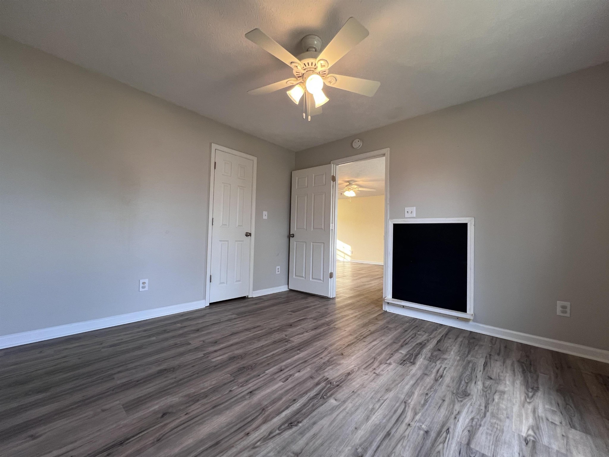 530 Stout Street Savannah, TN 38372 - Photo 20 of 39 a view of an empty room with wooden floor