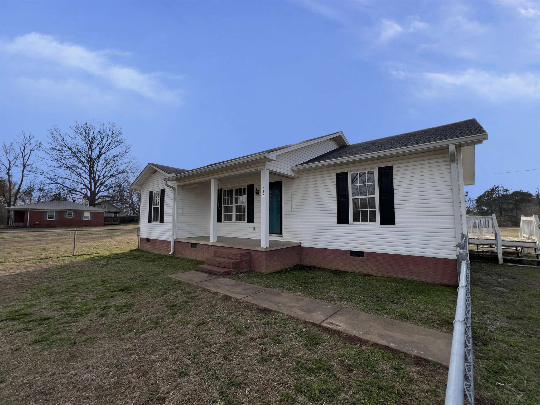 530 Stout Street Savannah, TN 38372 - Photo 2 of 39 a view of a house with a backyard