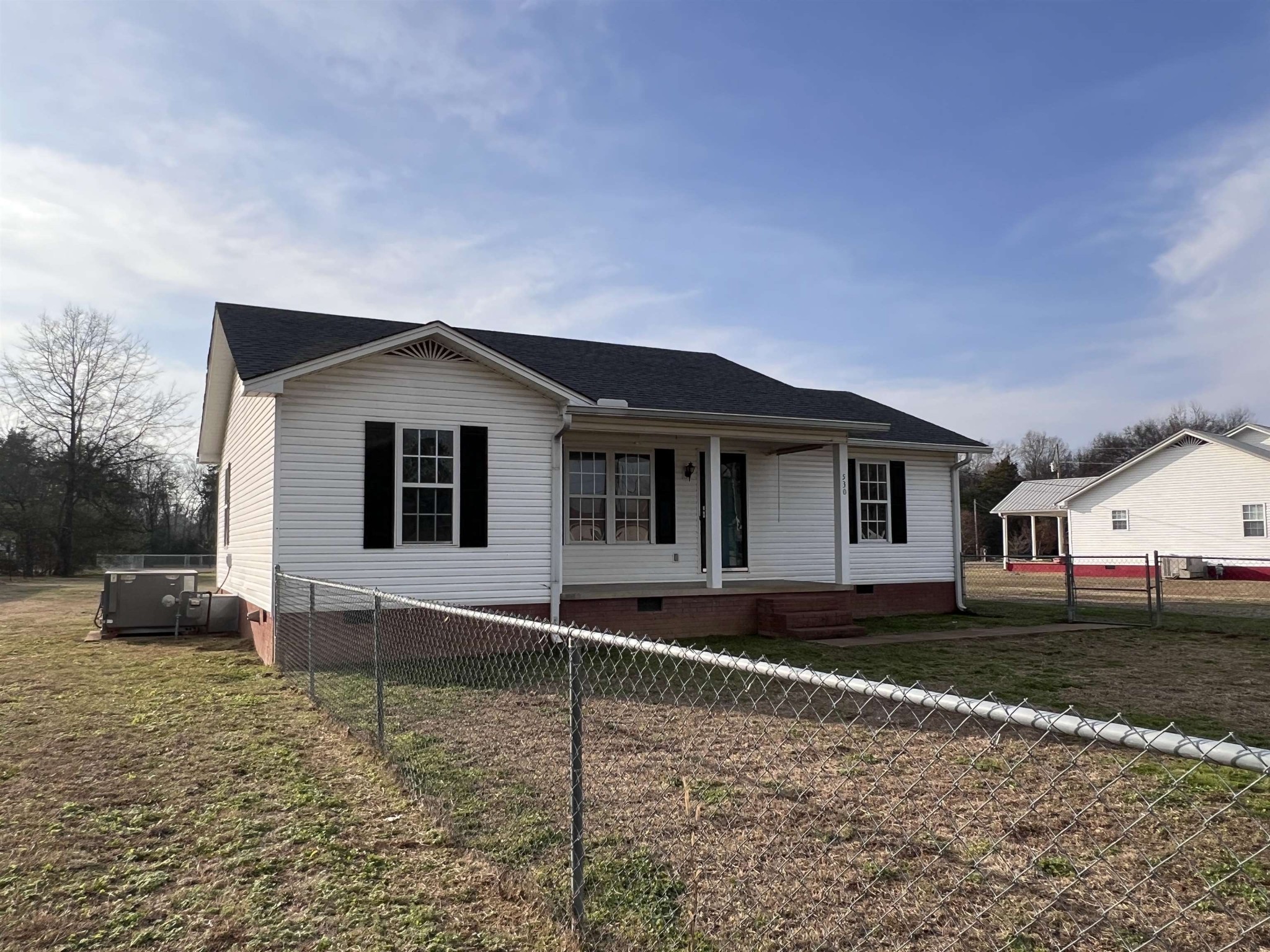 530 Stout Street Savannah, TN 38372 - Photo 29 of 39 a house with trees in the background