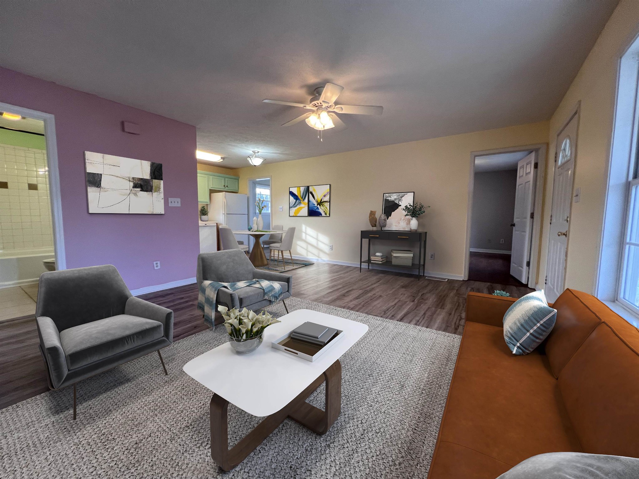 530 Stout Street Savannah, TN 38372 - Photo 5 of 39 a living room with furniture and wooden floor