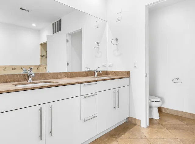 a bathroom with a sink and a toilet