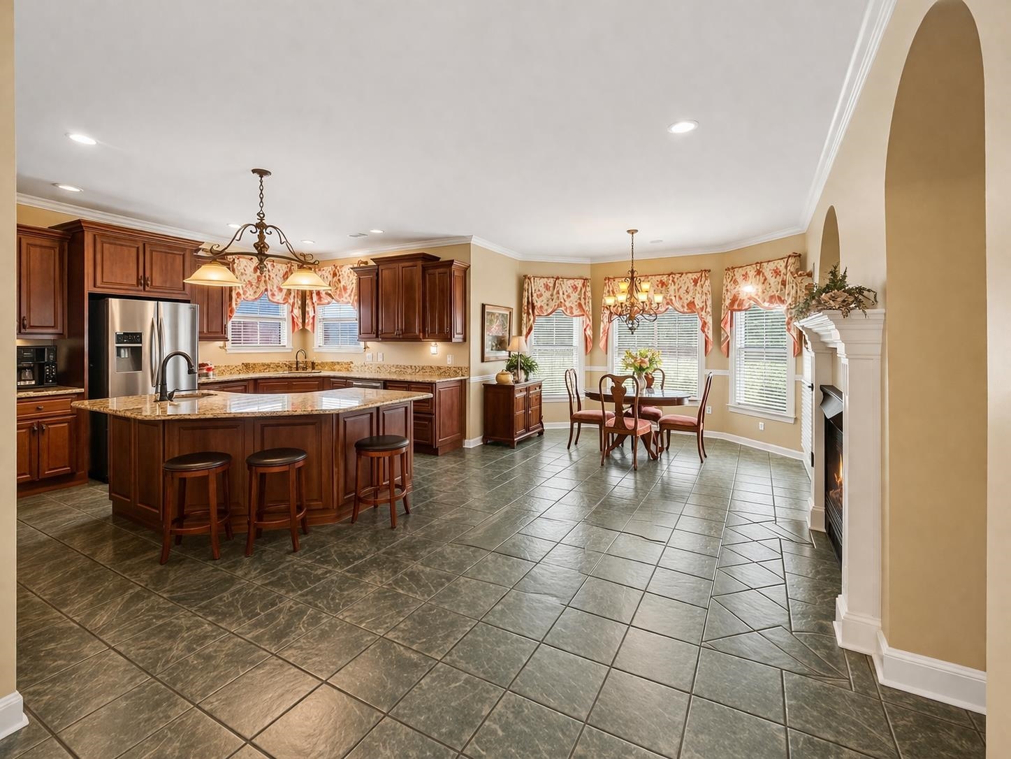 985 Collingham Cove Collierville, TN 38017 - Photo 3 of 17 a kitchen with a table and chairs