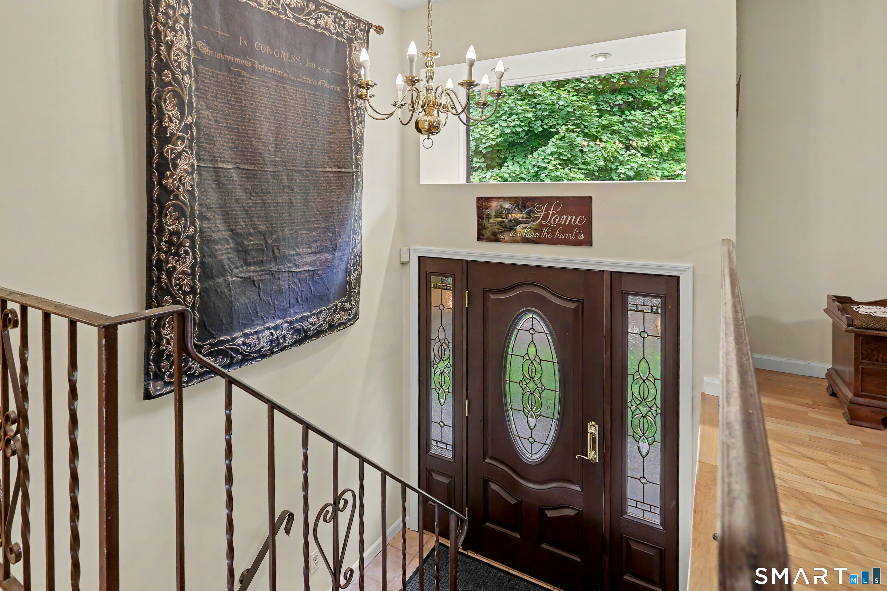 632 Wheelers Farm Road Orange, CT 06477 - Photo 3 of 39 a view of a entryway door with wooden floor