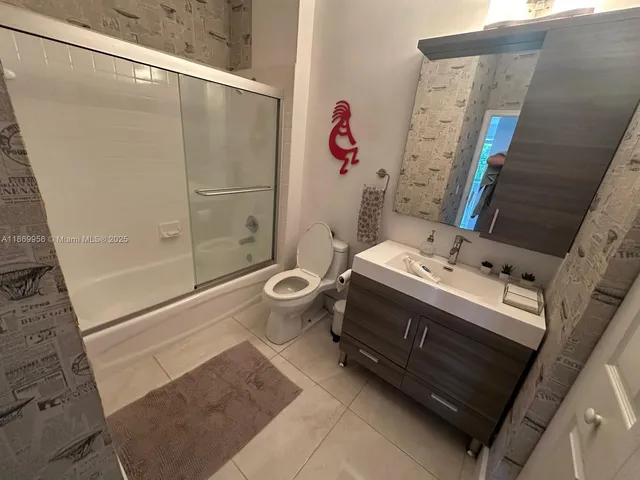 a view of a workspace with furniture