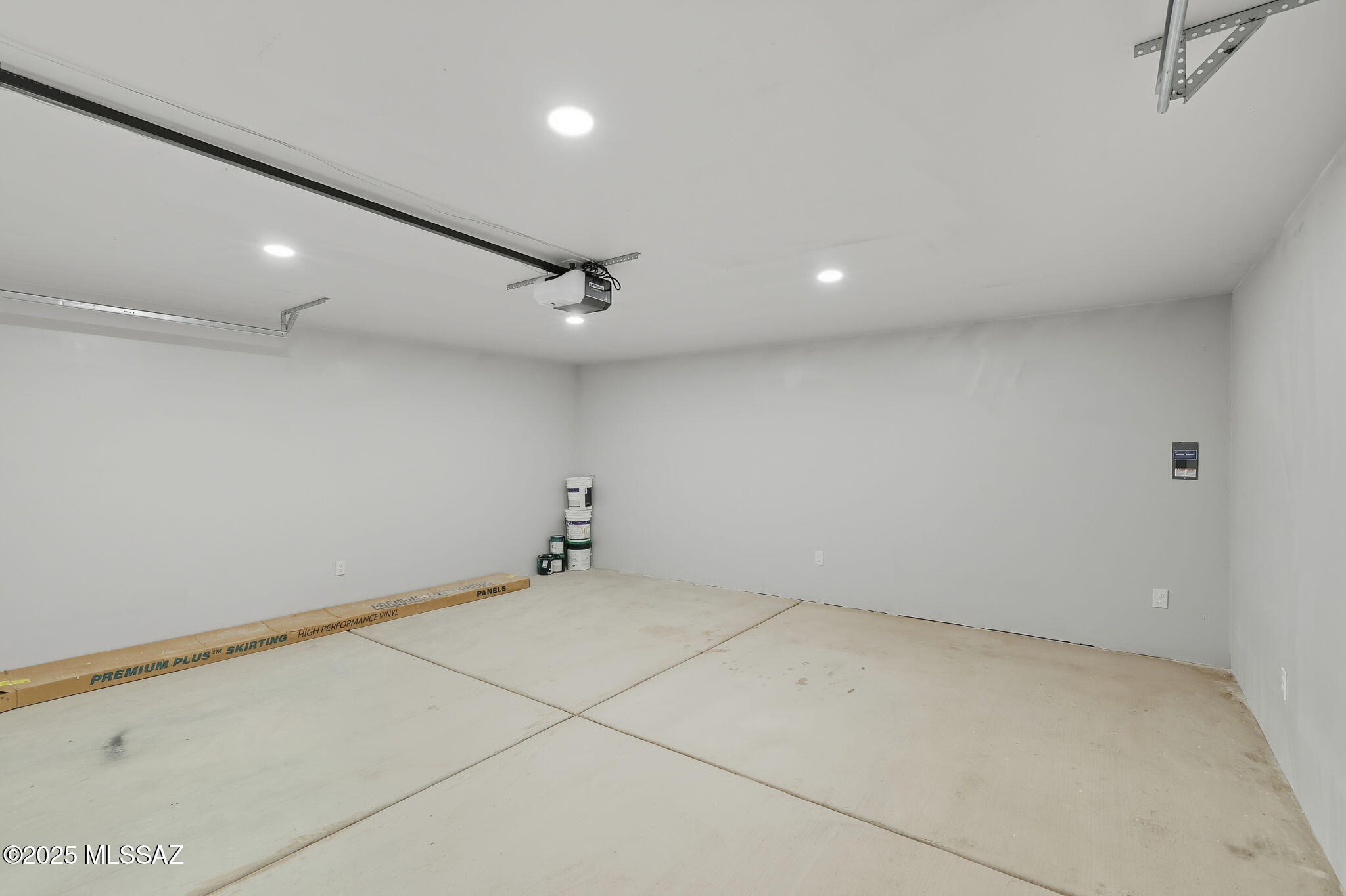8790 North Trico Road Marana, AZ 85653 - Photo 30 of 35 an empty room with a ceiling fan and window