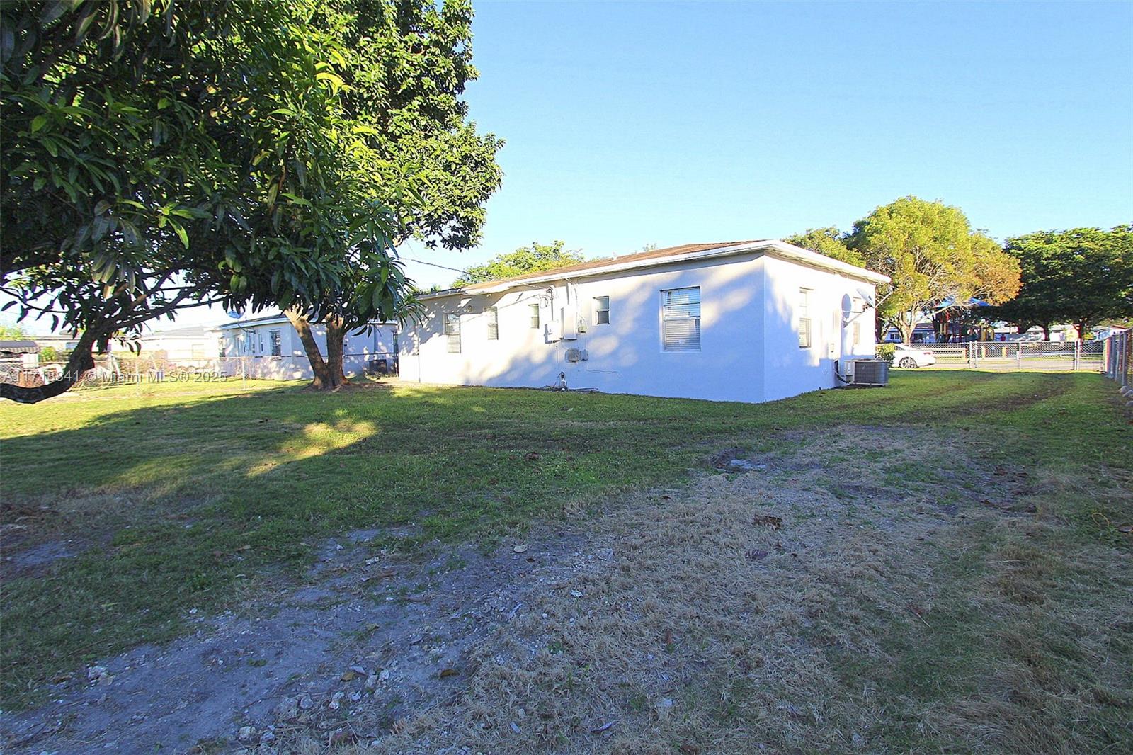 14340 Graves Drive Miami, FL 33176 - Photo 14 of 16 a view of yard with tree and green space