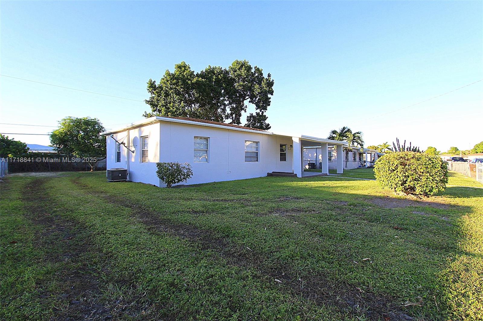 14340 Graves Drive Miami, FL 33176 - Photo 15 of 16 a backyard of a house with lots of green space