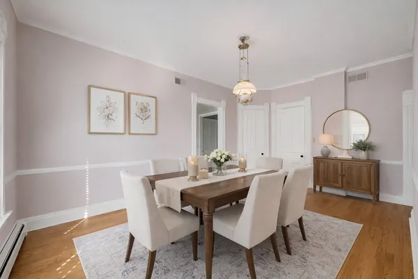 a view of a dining room with furniture