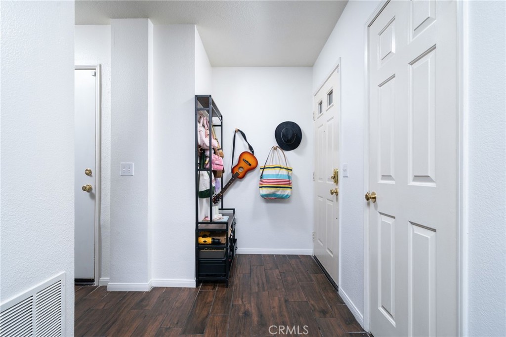 3707 Calle Curacso Riverside, CA 92503 - Photo 9 of 43 a view of empty room with wooden floor