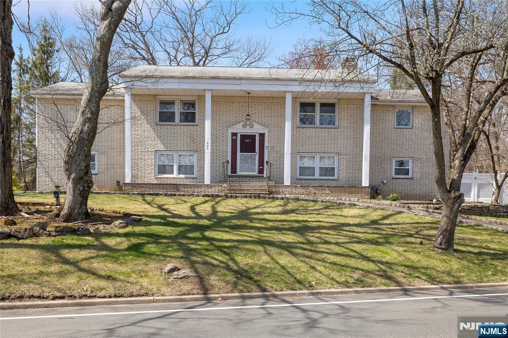 682 Floyd Street Englewood Cliffs, NJ 07632 - Photo 1 of 33 a view of a house with a yard