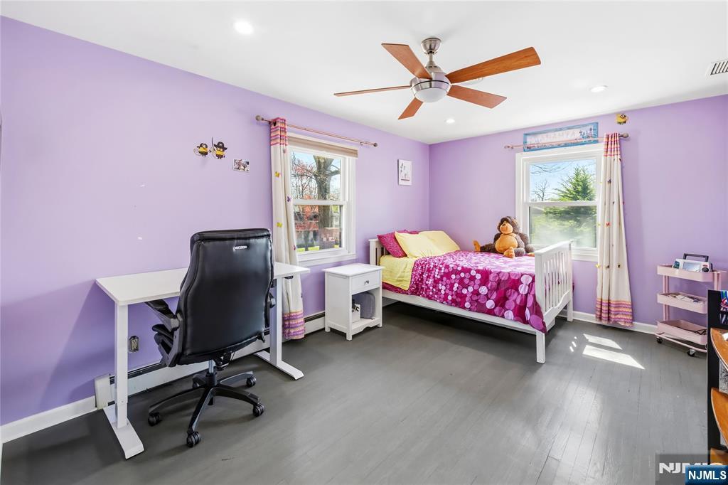 682 Floyd Street Englewood Cliffs, NJ 07632 - Photo 18 of 33 a bedroom with a bed and a window