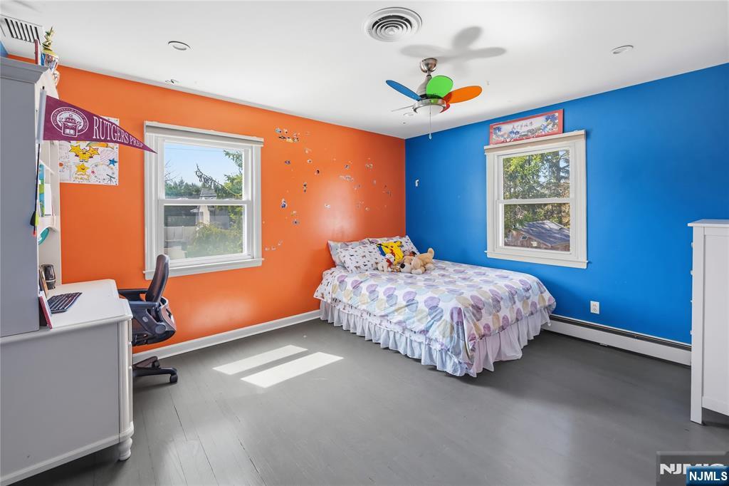 682 Floyd Street Englewood Cliffs, NJ 07632 - Photo 20 of 33 a bedroom with a bed and a window