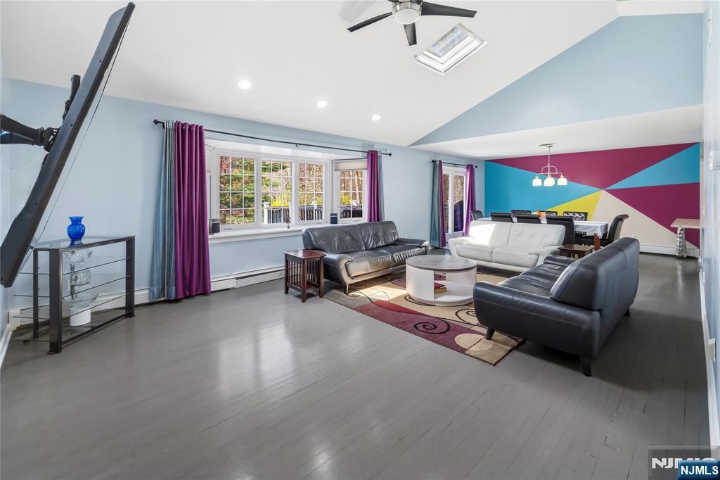 682 Floyd Street Englewood Cliffs, NJ 07632 - Photo 5 of 33 a living room with furniture and a window