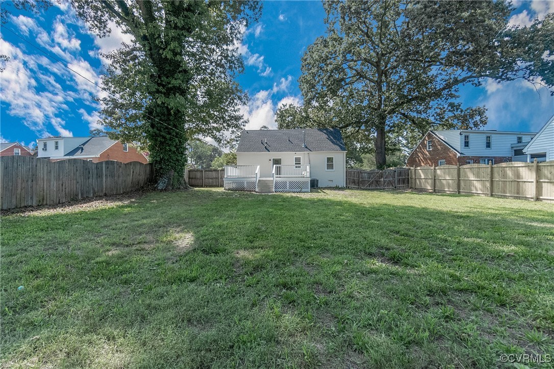 1507 Foster Road Richmond, VA 23226 - Photo 15 of 16 a view of a big yard with large tree and wooden fence