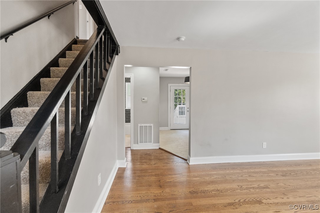 1507 Foster Road Richmond, VA 23226 - Photo 2 of 16 a view of an entryway with wooden floor