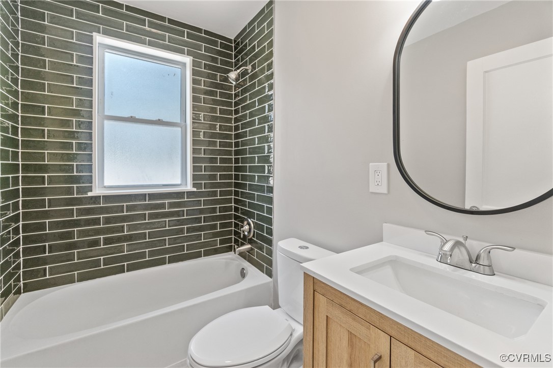 1507 Foster Road Richmond, VA 23226 - Photo 7 of 16 a bathroom with a sink toilet and shower