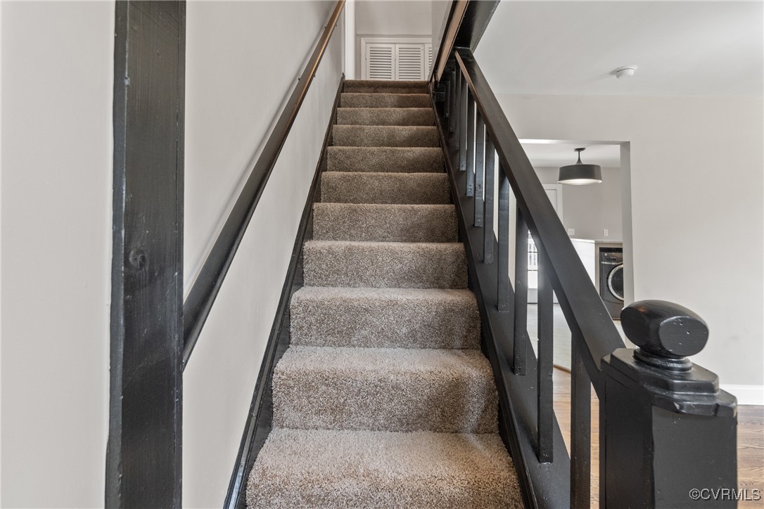 1507 Foster Road Richmond, VA 23226 - Photo 10 of 16 a view of staircase with white walls and a window