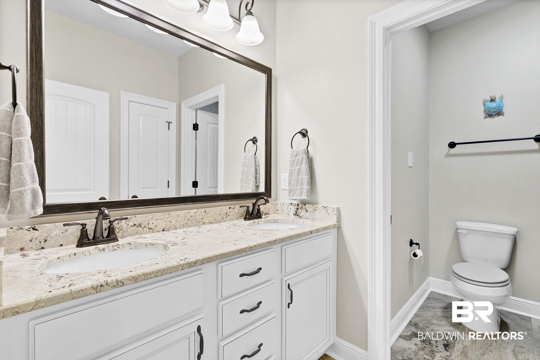 11247 Thistledown Loop Spanish Fort, AL 36527 - Photo 31 of 72 Bathroom featuring baseboards, a sink, toilet, and double vanity