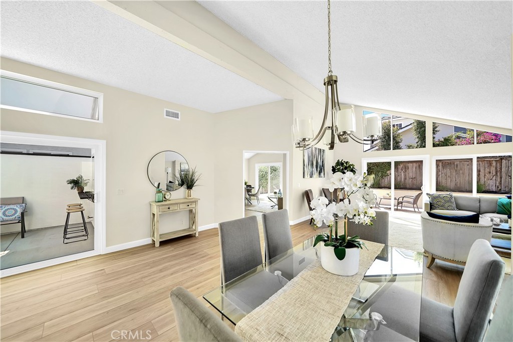 13 Willowbrook Irvine, CA 92604 - Photo 11 of 34 a living room with furniture and wooden floor