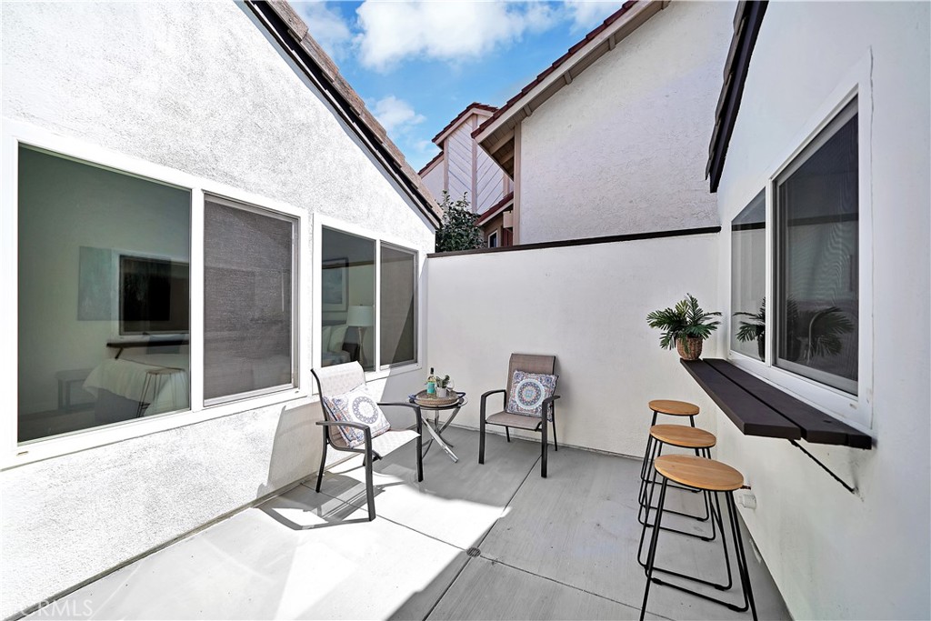 13 Willowbrook Irvine, CA 92604 - Photo 12 of 34 a building outdoor space with patio furniture