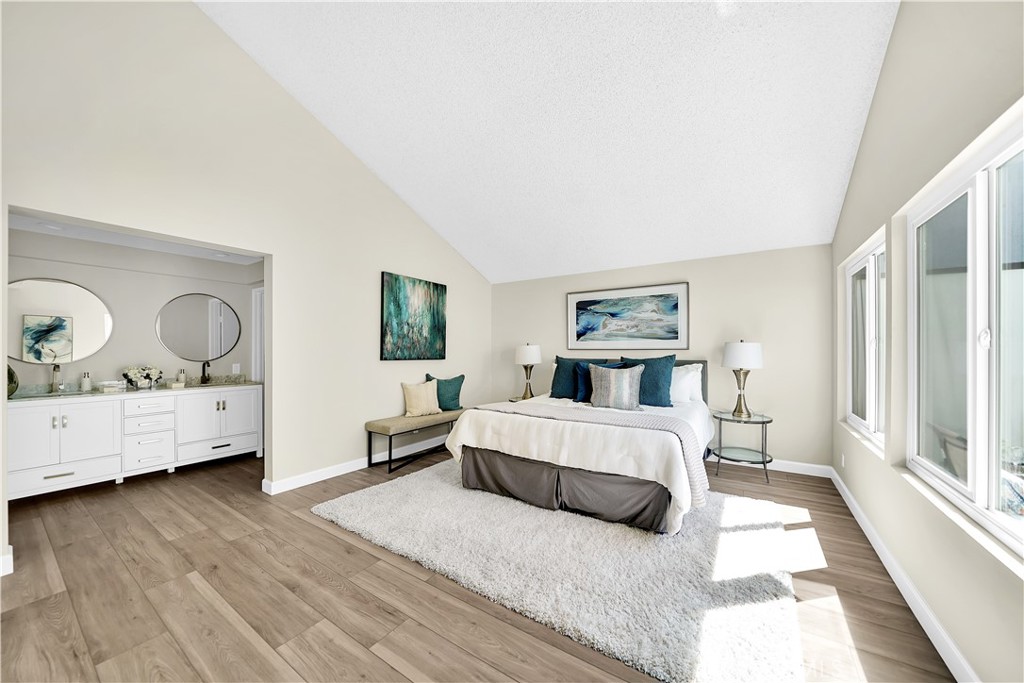 13 Willowbrook Irvine, CA 92604 - Photo 15 of 34 a bed room with bed and window