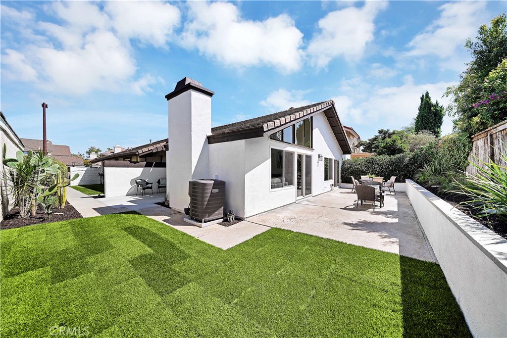 13 Willowbrook Irvine, CA 92604 - Photo 2 of 34 a view of a house with a yard and sitting area