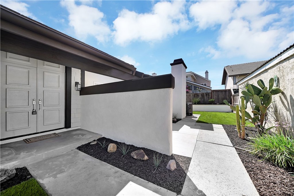 13 Willowbrook Irvine, CA 92604 - Photo 25 of 34 a backyard of a house with seating space