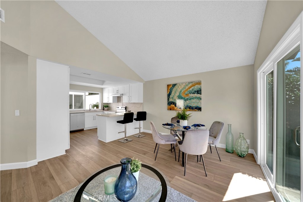 13 Willowbrook Irvine, CA 92604 - Photo 9 of 34 a living room with furniture and wooden floor