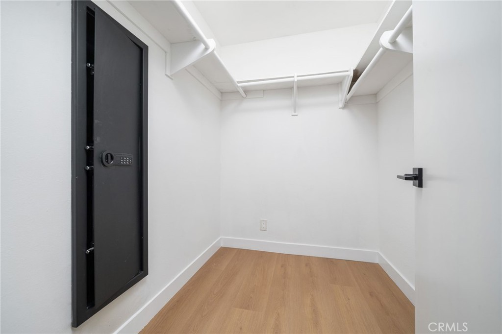 1153 Flintlock Road Diamond Bar, CA 91765 - Photo 11 of 16 a view of a room with racks on the wall