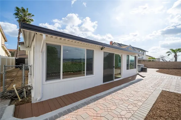 a view of a house with a patio
