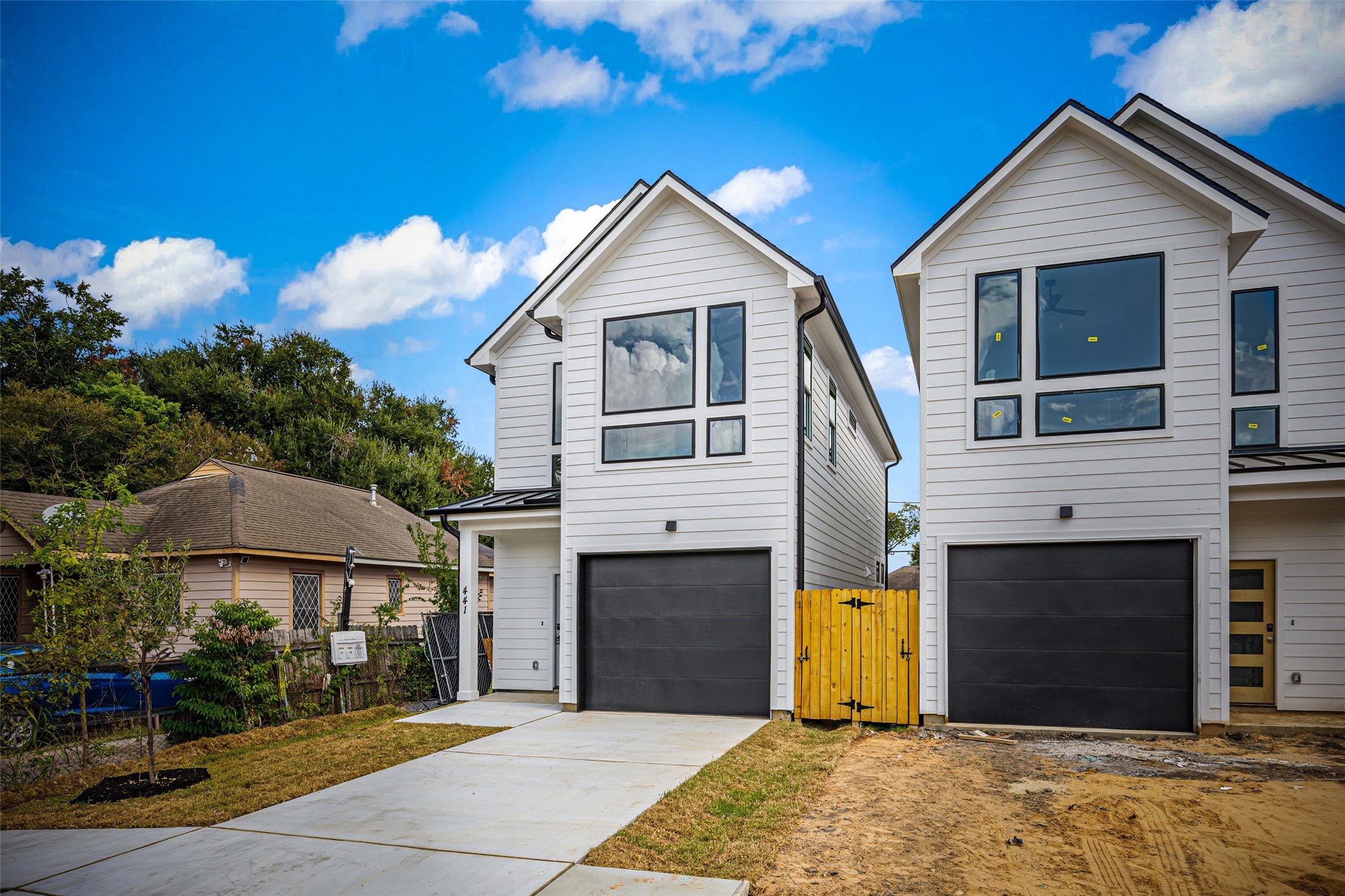 441 Hahlo Street Houston, TX 77020 - Photo 4 of 28 a front view of a house with a yard and garage