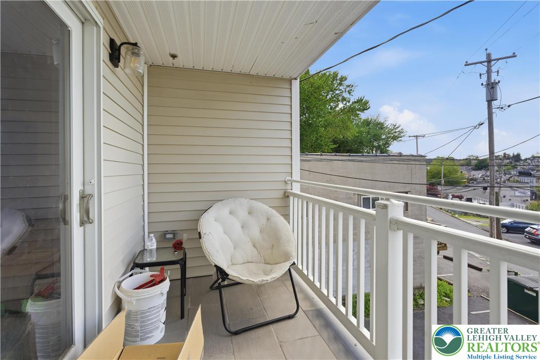 623 Walnut Street, Unit A2 Easton, PA 18042 - Photo 19 of 21 a view of a chair in the balcony