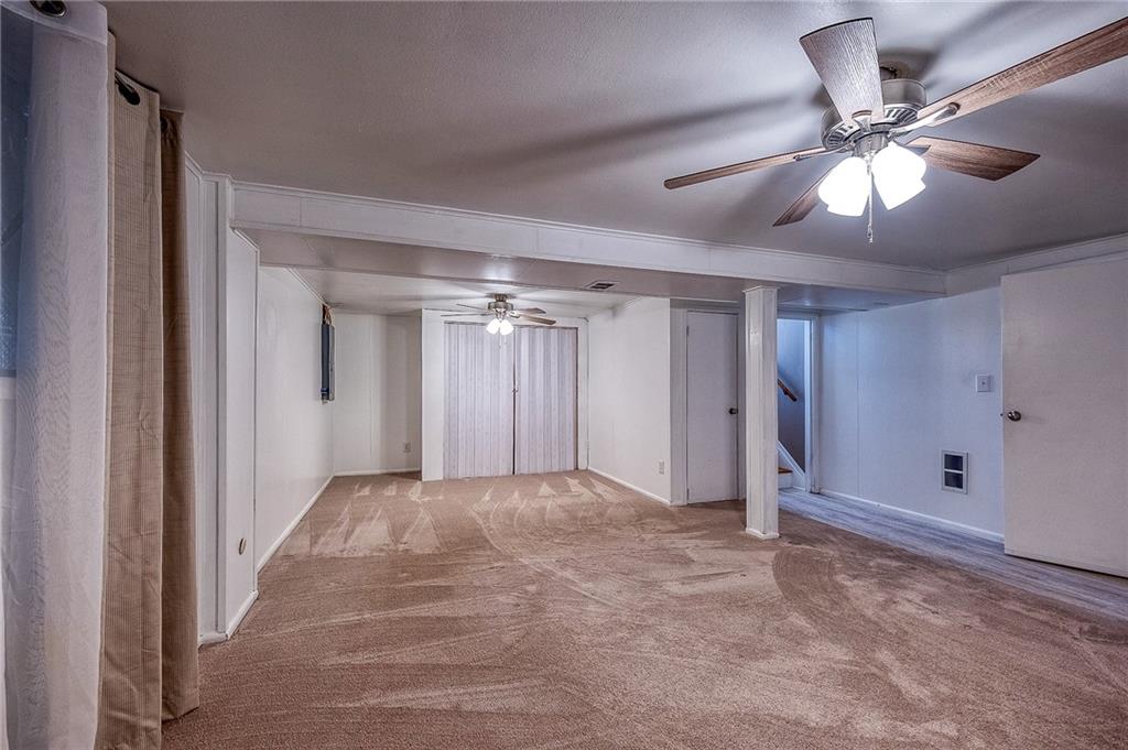 9871 Deerfield Drive Irwin, PA 15642 - Photo 22 of 35 a view of an empty room and chandelier fan