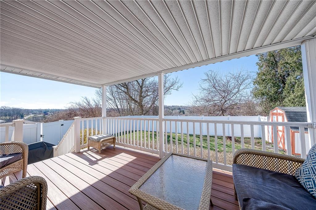 9871 Deerfield Drive Irwin, PA 15642 - Photo 24 of 35 a view of a balcony with furniture