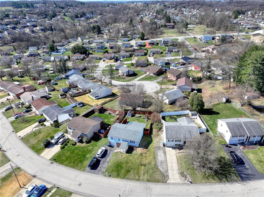 9871 Deerfield Drive Irwin, PA 15642 - Photo 30 of 35 an aerial view of residential houses with outdoor space