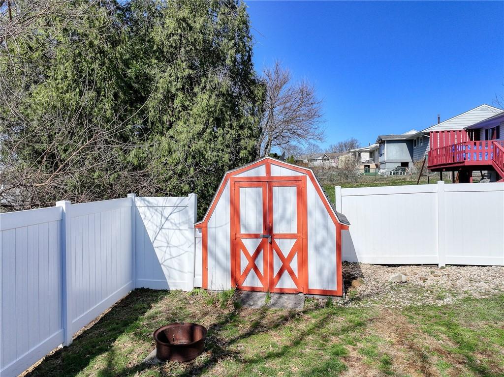 9871 Deerfield Drive Irwin, PA 15642 - Photo 32 of 35 a view of a bench in a backyard