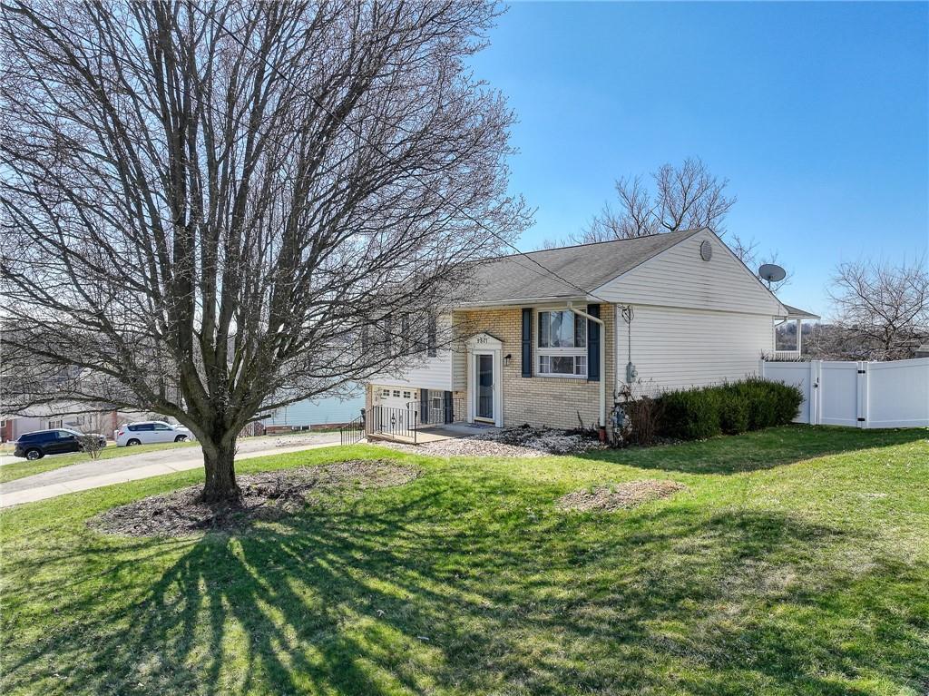 9871 Deerfield Drive Irwin, PA 15642 - Photo 34 of 35 a front view of a house with yard and green space