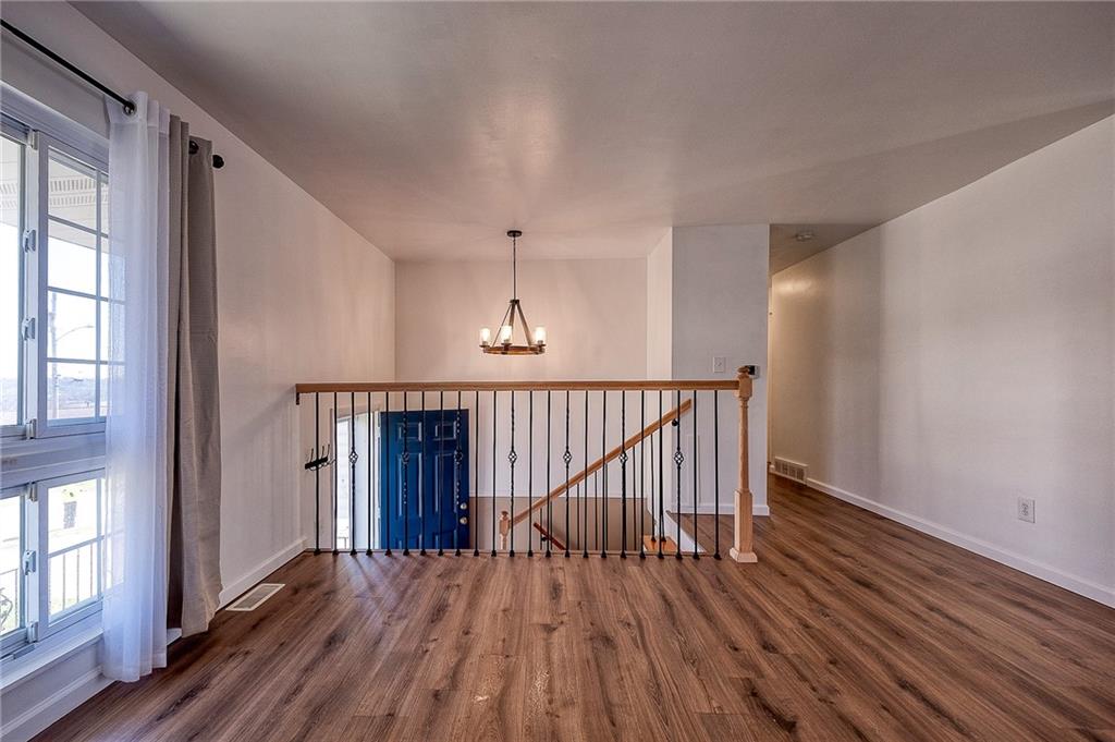 9871 Deerfield Drive Irwin, PA 15642 - Photo 10 of 35 wooden floor in an empty room